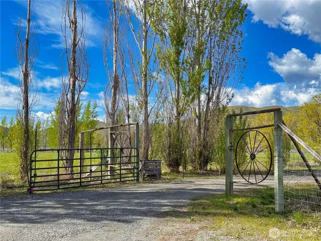 Gated entry to home and outbuildings