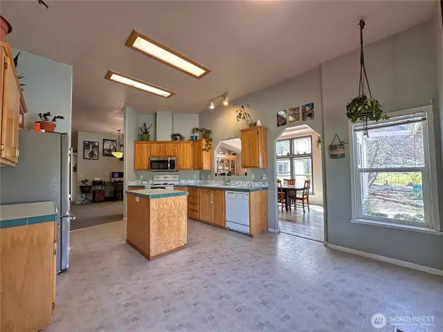 Large kitchen with island, newer SS refrigerator & microwave