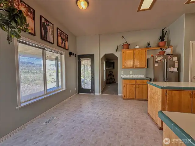 There's a perfect spot for a breakfast table and exit door leads to comfortable 456sf covered porch