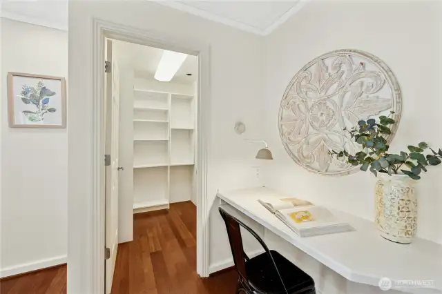 There is a handy kitchen office space plus a roomy walk-in pantry.