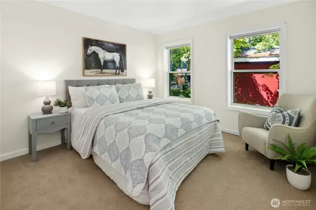 Heading over to the opposite side of the home and the second bedroom. All of the bedrooms have brand-new carpeting.