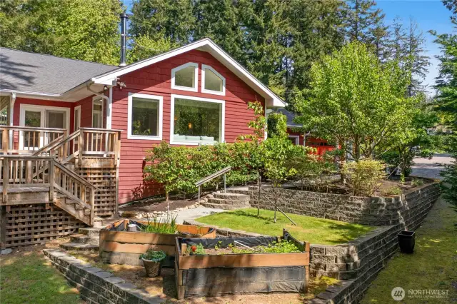 Two of the garden beds and the terraces on the back side of the property.
