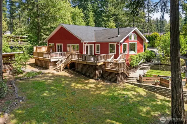 An aerial view of the back deck and grassy area.