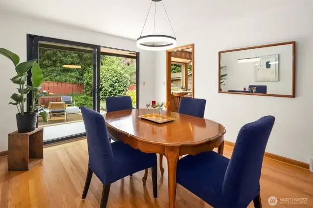 Dining area with sliding doors to back patio & garden