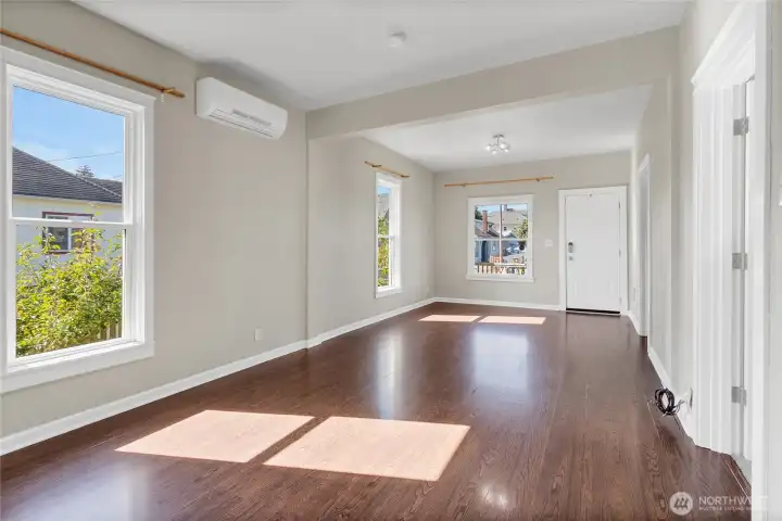 Tons of natural light, soaring ceilings, & an open-concept make every inch feel bigger than the square footage.