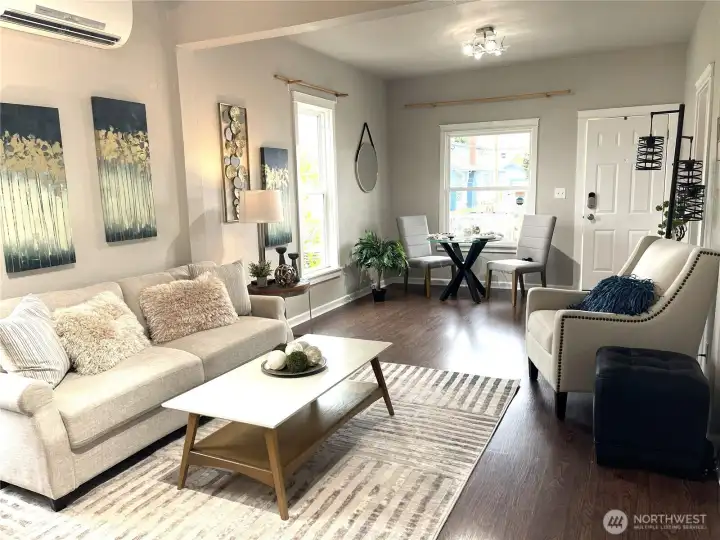 Square footage doesn’t tell the whole story! See for yourself how soaring ceilings, natural light, and FULL-SIZED furniture prove this 836 sq ft stylish home lives more like 1,500 sq ft with room to spare.