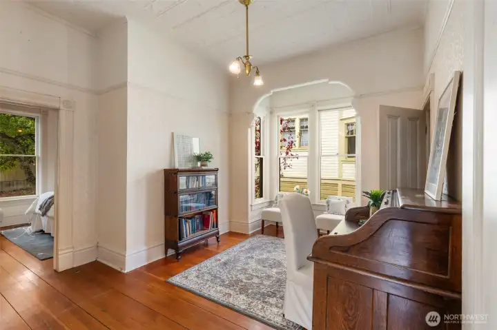 Elegant, curved archways and tall windows.