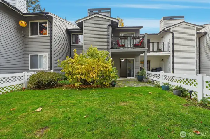 The unit's backyard off the patio