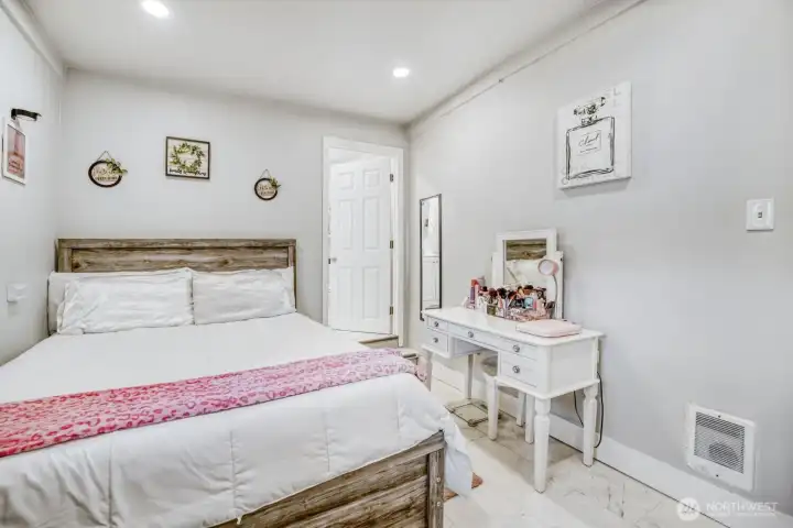 Bedroom with convenient access to ensuite bathroom for added privacy.