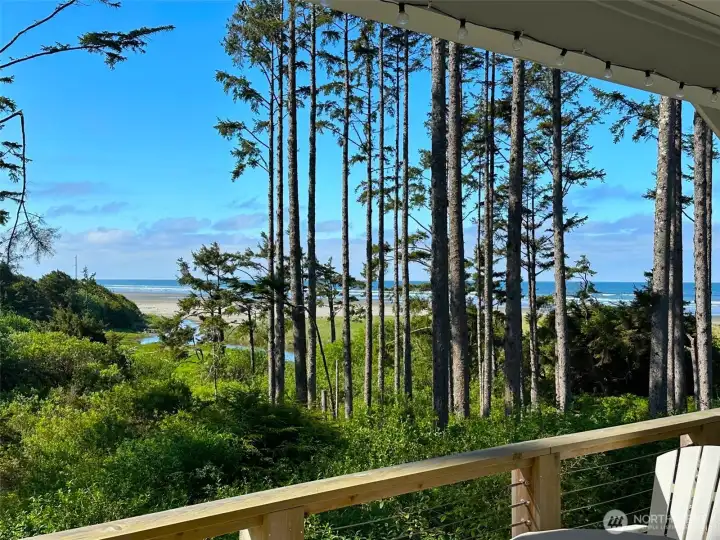 This is why you are here!  The expansive view of the ocean and Elk Creek is bliss.  Sit beneath the trees and covered back porch with twinkle lights and the sights and smells of the beautiful Pacific.