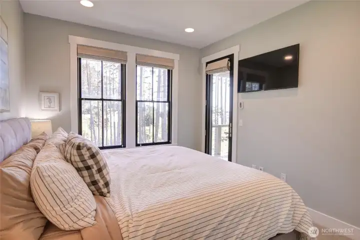 Open the door and watch the ocean waves from this king bed with gorgeous bath.