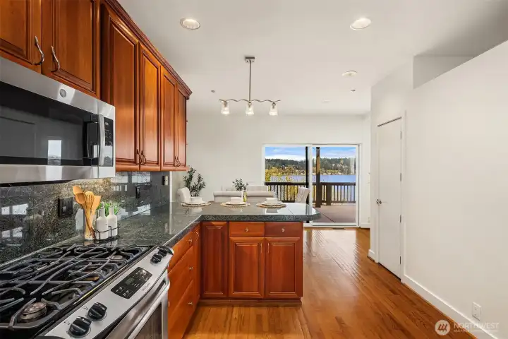 Lake views from the kitchen too. There's two pantry closets, lots of cabinets, and plenty of space and potential to reinvent the space