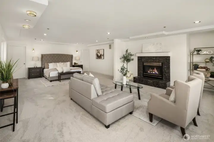 An incredible primary suite with stunning lake views