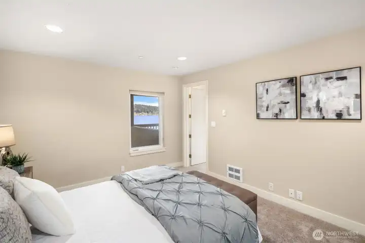 One of two bedrooms in the lower level, again with views of the lake. Enlarge the window for an even better lake view