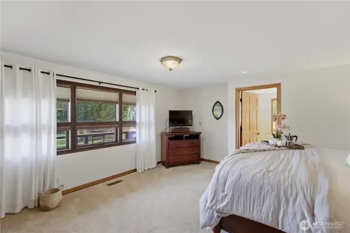 Large master has plenty of room and great views of the property.