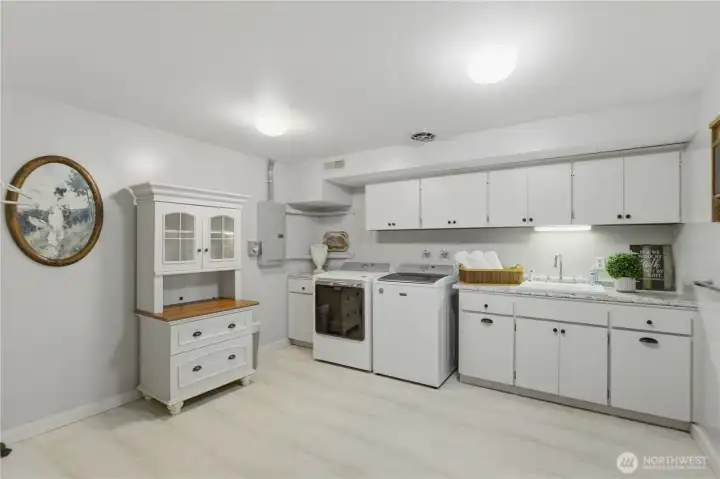 Downstairs utility room is prime for being a second kitchen and setting up a lower level apartment