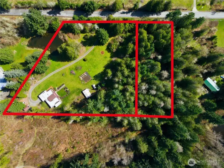 Home with additional lot of 1.39 acres with separate tax parcel.