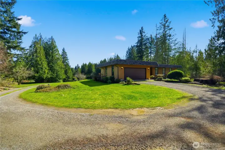 View from back of lot looking back at house.  Lots of room for parking, Rv’s and equipment storage