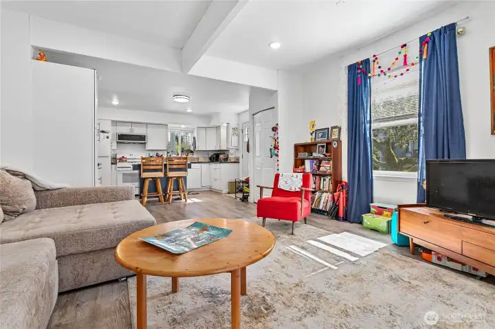 Looking back toward the kitchen on the main floor, Unit B is over 1,128 square feet of remodeled living space.