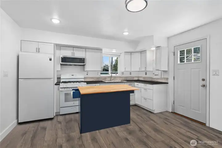 New kitchen and appliances, updating lighting fixtures and doors.