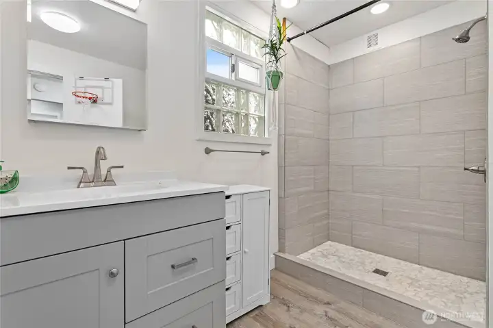 One of two remodeled main floor bathrooms.