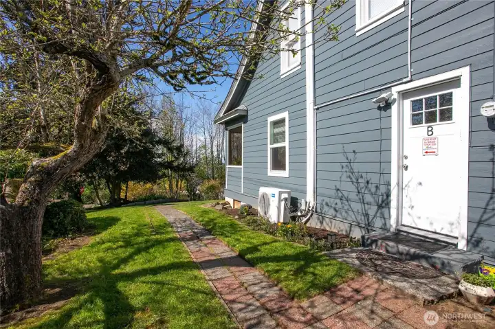 Side entry to the main floor unit.