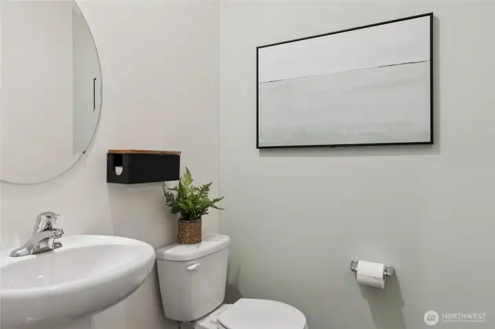 Half bath on the main level, right around the corner from the living room. Photo is for representation only.