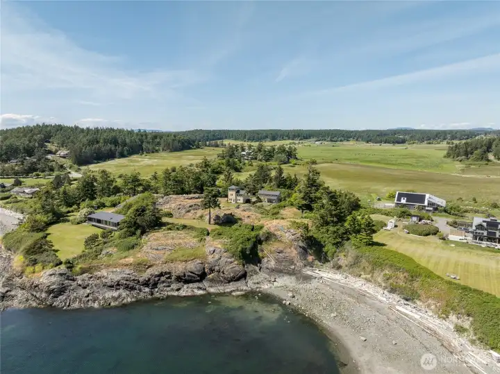 The overview of the property shows the buildings on the highest rocky bench with lower level grass and rock which eliminates erosion worries. The overview of the property shows the buildings on the highest rocky bench with lower level grass and rock which eliminates erosion worries.
