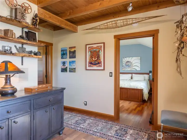 Second floor landing with doors to the bedroom and half bath. Second floor landing with doors to the bedroom and half bath.