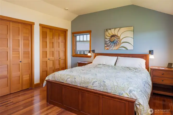 Primary bedroom with double closets. Primary bedroom with double closets.