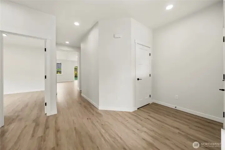 Another view of the entry way. Two bedrooms to the left and a full bath. Another view of the entry way. Two bedrooms to the left and a full bath.