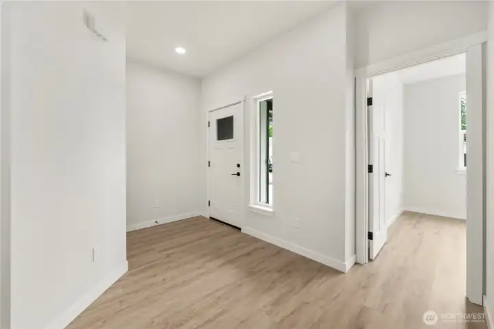 Entry way into the home/coat closet in front. One of the bedrooms to the right. Entry way into the home/coat closet in front. One of the bedrooms to the right.