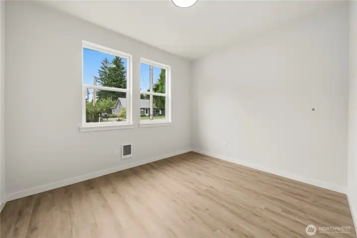 Front bedroom w/ a walk in closet. Front bedroom w/ a walk in closet.