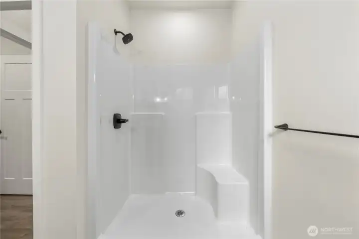Walk in shower for the primary suite Walk in shower for the primary suite