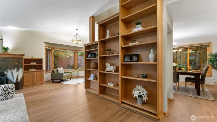 The home offers a circular floorplan with access on both sides of the stairway into the kitchen and dining areas.