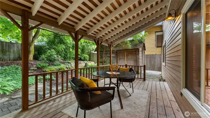 A French door off the kitchen/dining area leads to a covered deck making barbecuing a year-round pleasure.