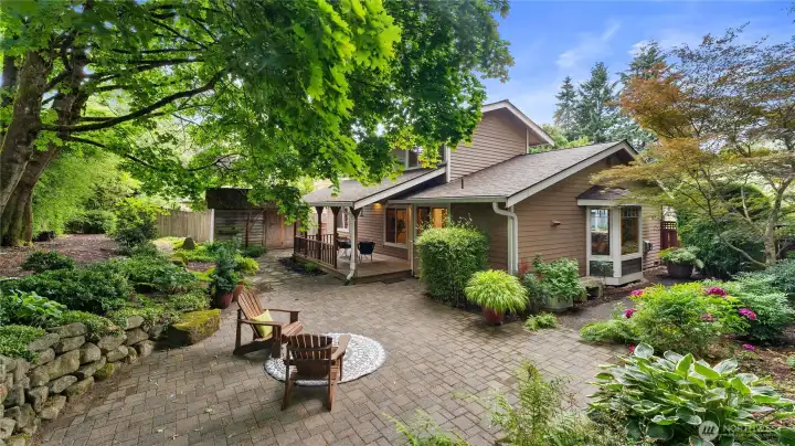 A paver patio extends the entertaining space of the yard.