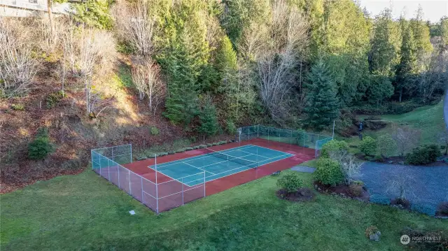 The home is just steps away from the community tennis court. There is also a path that leads to the Interurban trail below the neighborhood.