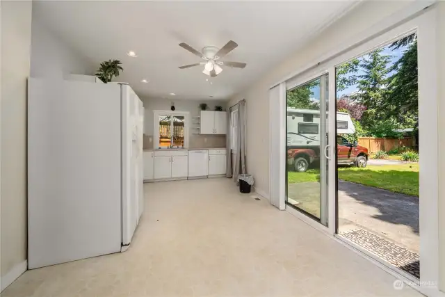 Large eat-in kitchen with slider to back yard and covered patio