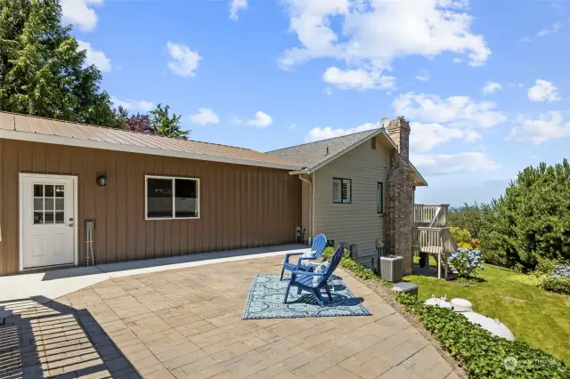 Side of main level garage with patio and swim spa!