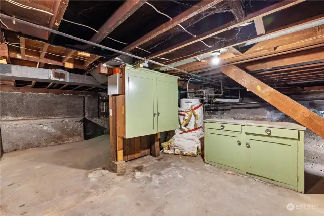 Unfinished basement with easy access to plumbing/electrical.