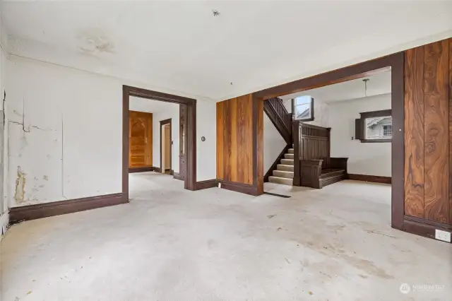 Large pocket door connects to the dining room.