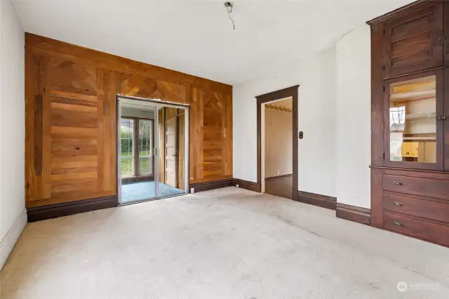 Dining room with original built-in cabinet. Cabinet now has pass through area to licthen in lower cabinet.