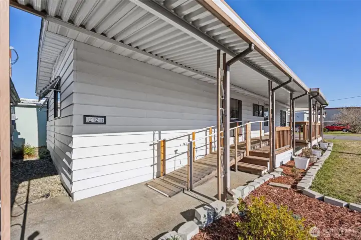 Front of home w/ carport to the left.