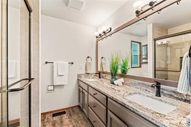 Primary ensuite with updated finishes from a cosmetic update in 2020.