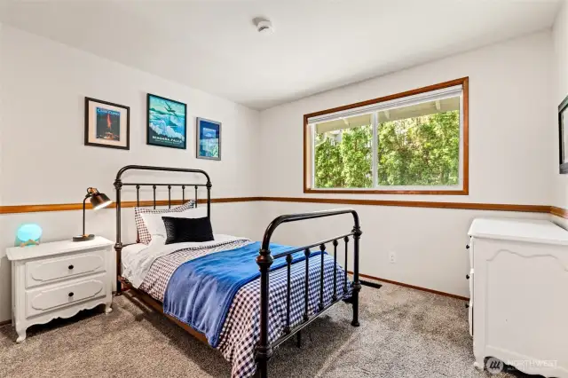 Secondary bedroom number two with lots of natural light and ample storage space.