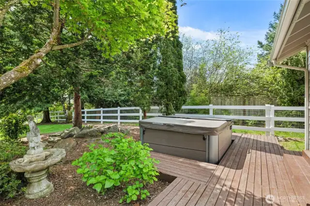 Soak, sip, and stargaze from the 2022 hot tub and deck—designed with comfort in mind.