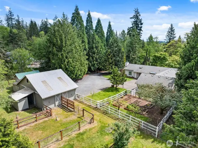 Bird's-eye view of a beautiful blend of home and nature—over 2 acres of opportunity await!