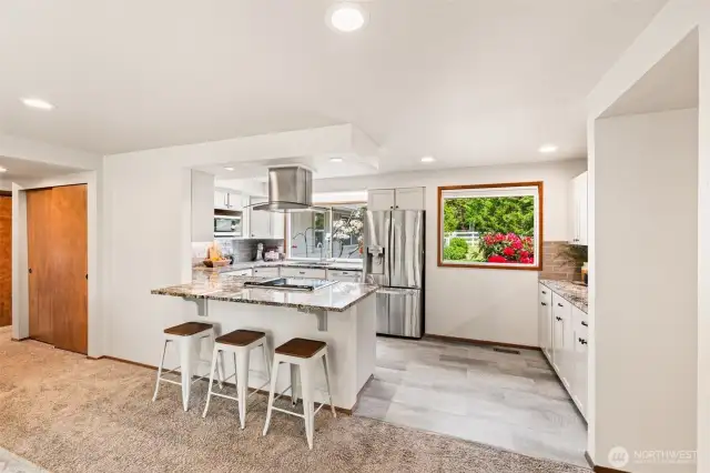 Bright, airy, and full of possibilities—this kitchen has the space and natural light for your perfect coffee bar or eat-in area.