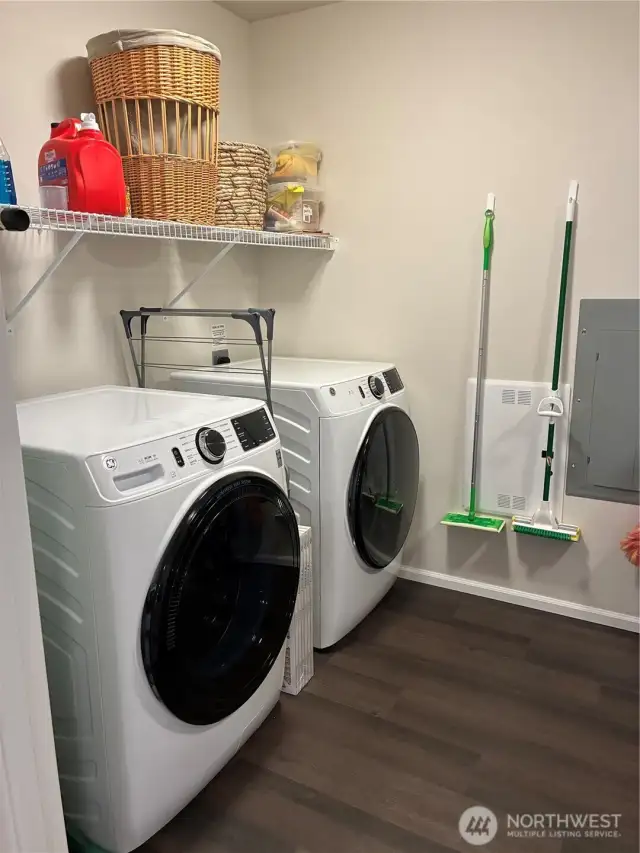 Utility room has front loading washer dryer and a small privately owned freezer that can be included in the sale.